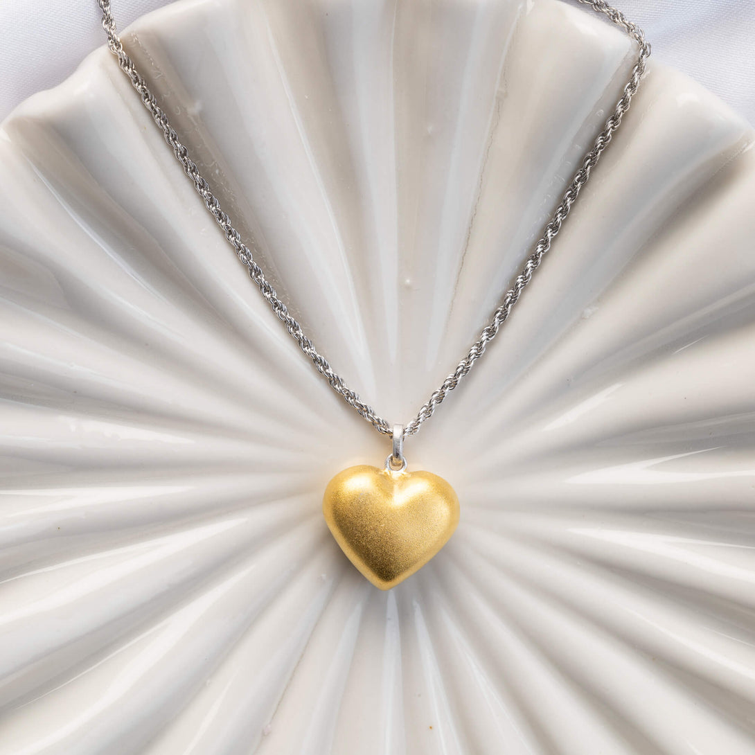 gold heart shaped locket necklace